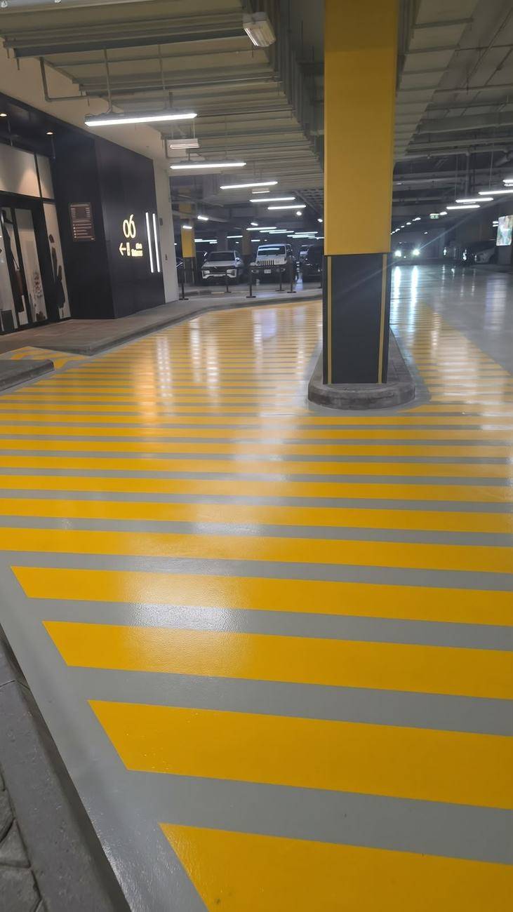 Car park epoxy flooring — pedestrian crossing markings — 06 Mall, Sharjah